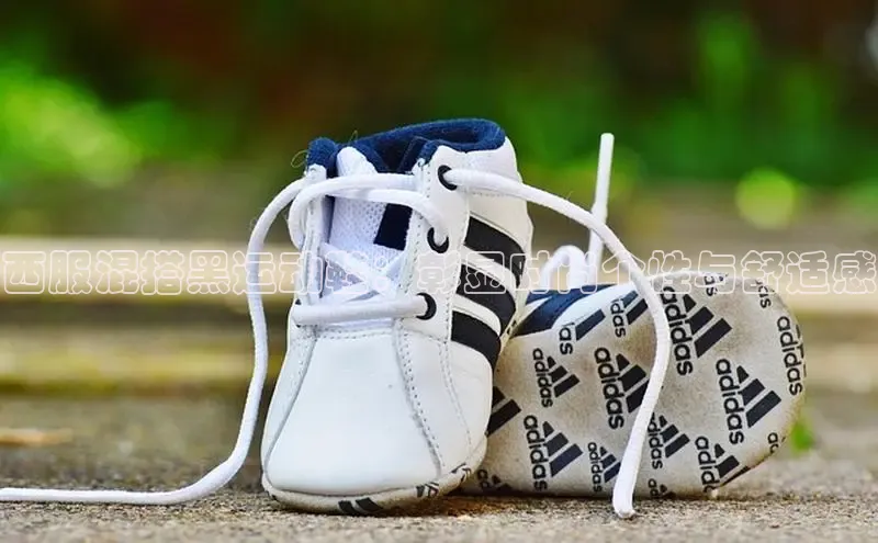 米兰网页版在线登录极氪智能科技西服混搭黑运动鞋：彰显时尚个性与舒适感